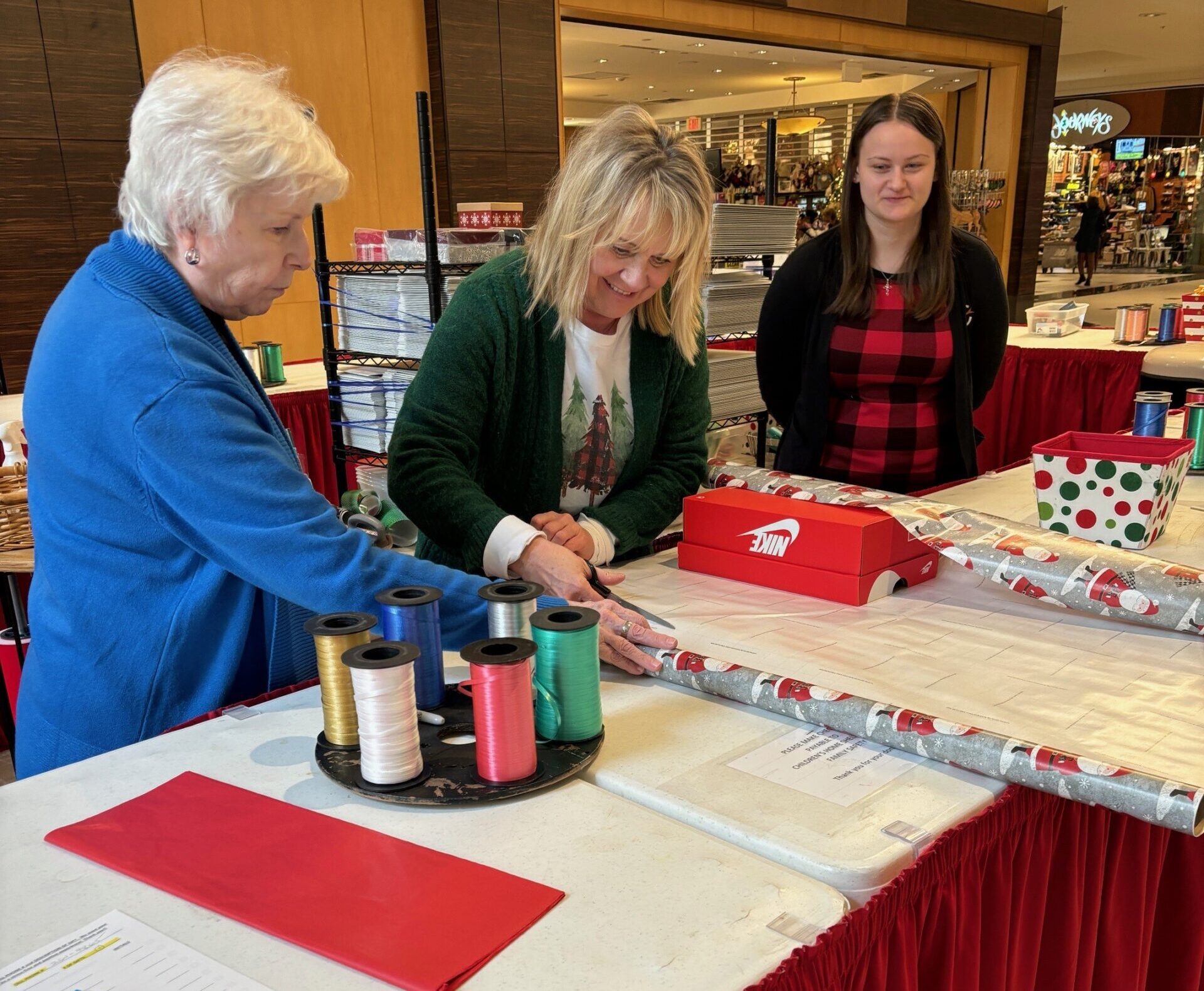 2024.12.06 JT, SM, EB gift wrapping at the mall Miracle Treat Day at Dairy Queen 2022 Huron Office Cornerstone Financial Solutions Inc