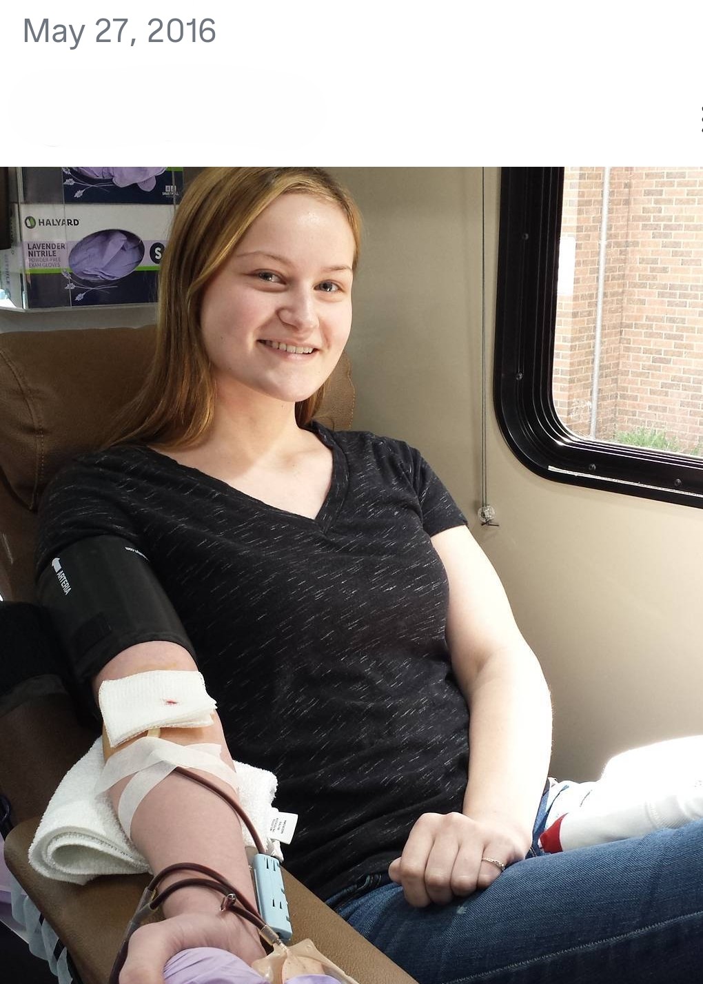 Elizabeth Braley giving blood for the first time at age 16.
